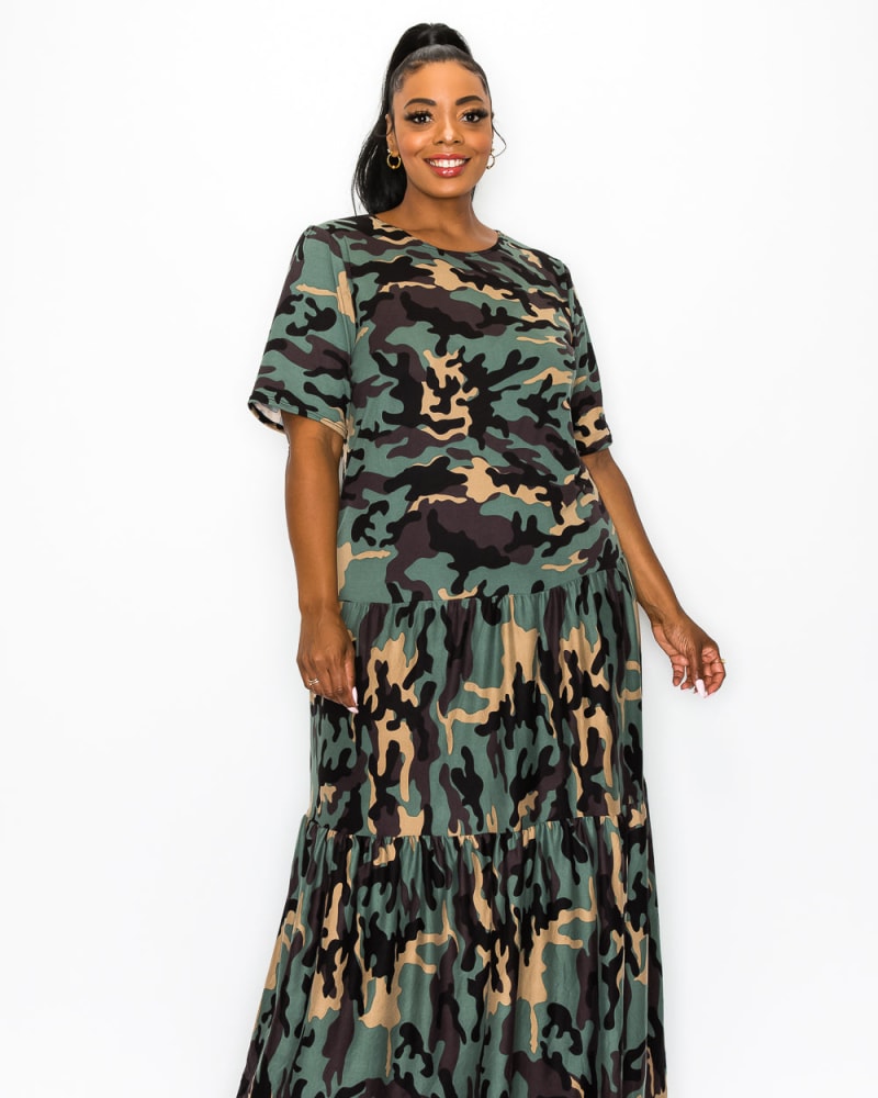 Front of a model wearing a size 1X Remi Camo Tiered Maxi Dress in Olive/Taupe by L I V D. | dia_product_style_image_id:241866